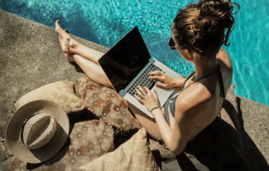 This is an image showing A Digital nomad who can work from anywhere in the world